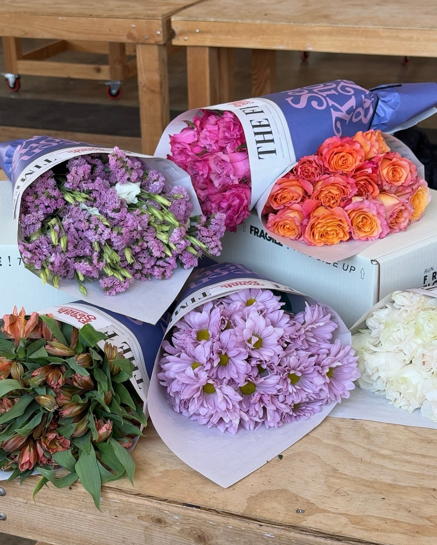 A variety of flowers ready for delivery from Fresh Sends, including vibrant tulips and soft lilies.-317234708847