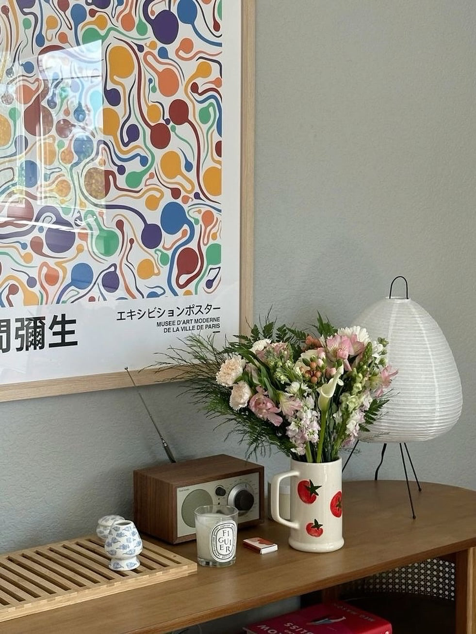 A Fresh Sends flower arrangement displayed on a bedroom nightstand, adding color and warmth to the room.-318725095791